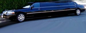 Image of black corporate Lincoln Town Car stretch limousine