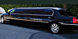 Image of black corporate Lincoln Town Car stretch limousine